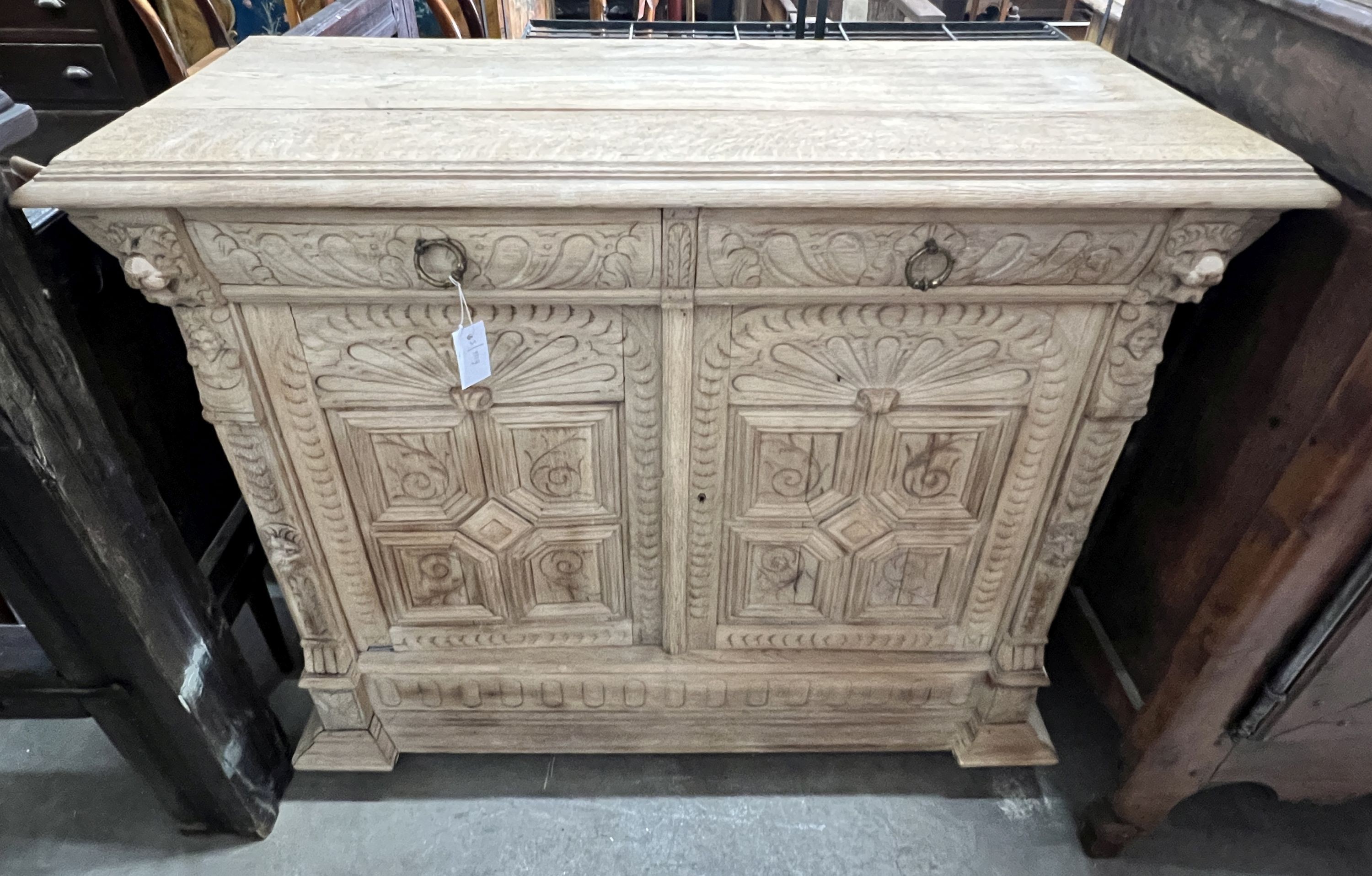 A late 19th century Flemish bleached oak buffet, length 120cm, depth 47cm, height 100cm